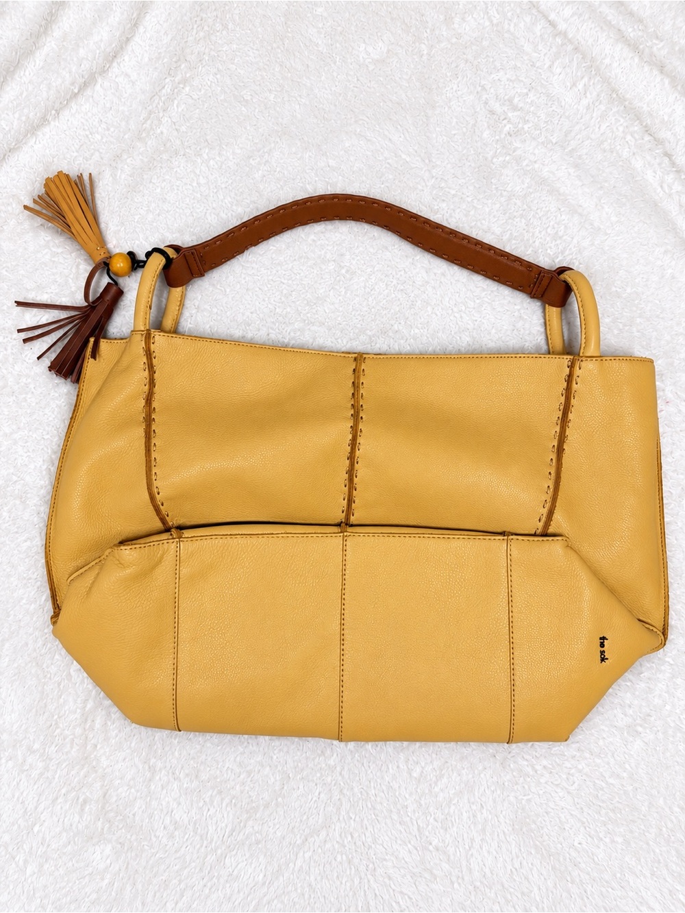 The Sak Mustard Yellow Shoulder Bag with Brown Handle and Tassel